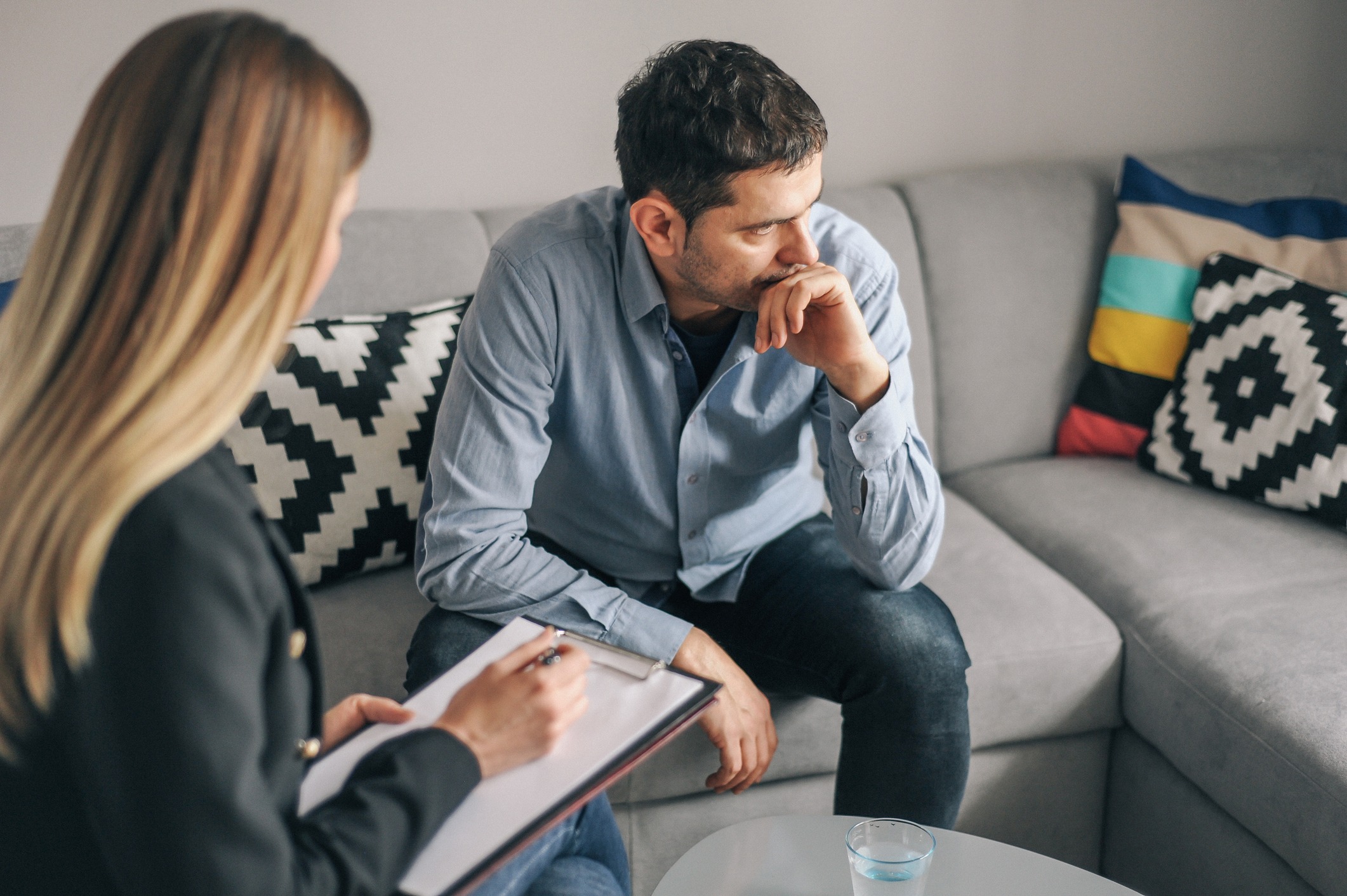 Young man, alcoholic, on therapy session